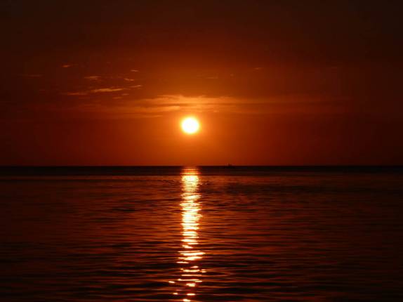 O incrível pôr-do-sol em Caye Caulker, na grande barreira de corais de Belize